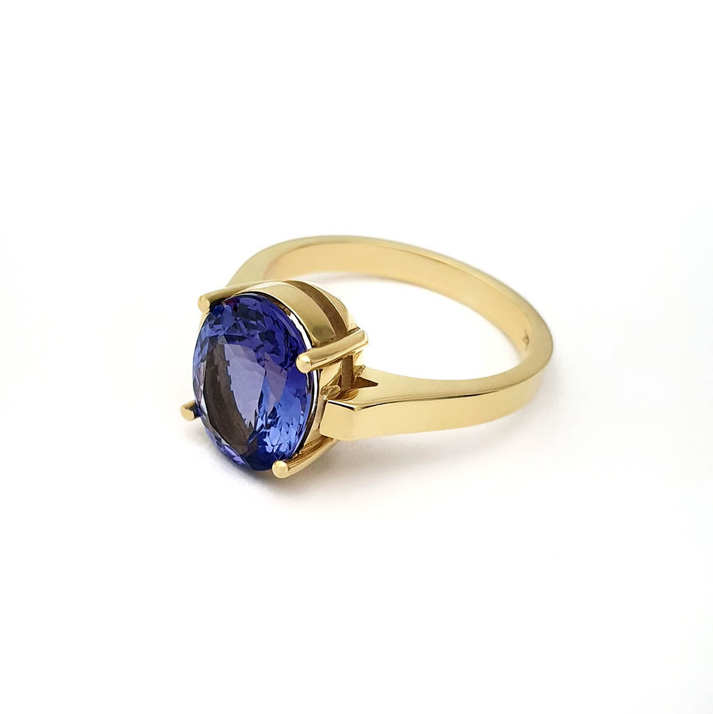 Handcrafted Oval-Cut Tanzanite Solitaire Ring in Yellow Gold