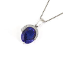 Handcrafted Oval Cut Tanzanite Pendant with Flush Set Diamond Accents