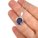 Handcrafted Oval Cut Tanzanite Pendant with Flush Set Diamond Accents