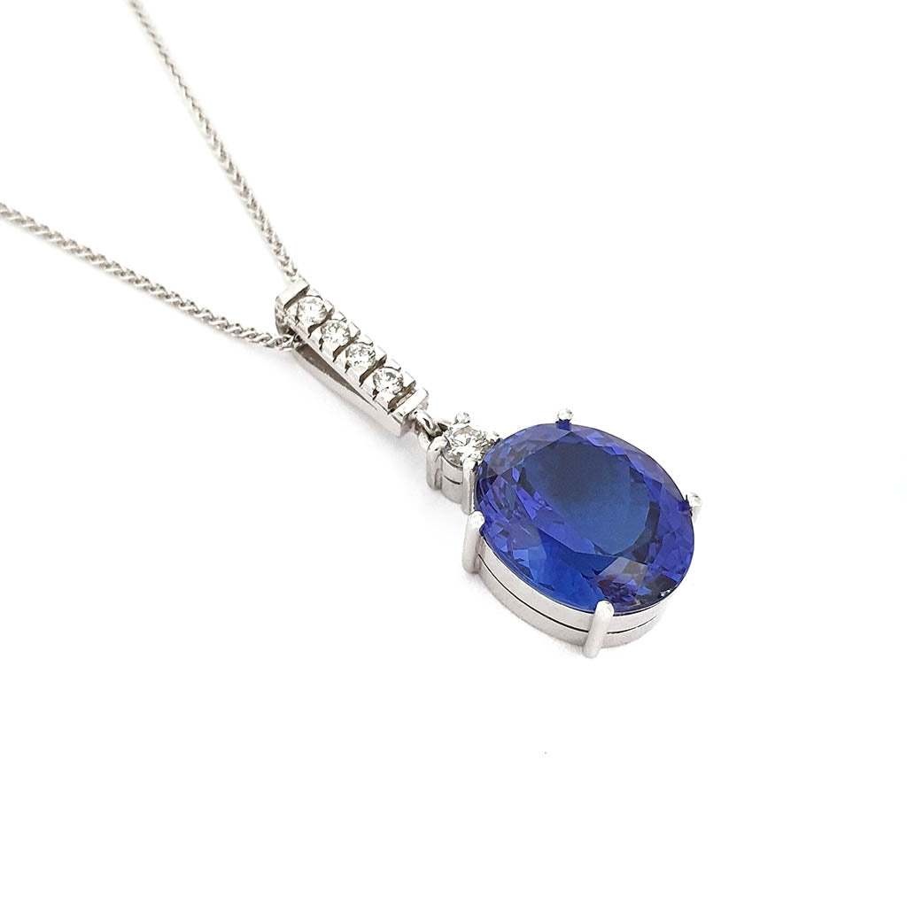 Handcrafted Oval Cut Tanzanite and Diamond Pendant