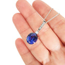 Handcrafted Oval Cut Tanzanite and Diamond Pendant
