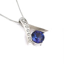 Handcrafted Tanzanite with Eight Diamond Ribbon Pendant