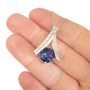 Handcrafted Tanzanite with Eight Diamond Ribbon Pendant