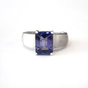 Handcrafted Unisex Emerald Cut Tanzanite Ring with Brushed Band Detail