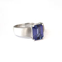 Handcrafted Unisex Emerald Cut Tanzanite Ring with Brushed Band Detail