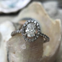 Oval Cut Diamond Ring with Diamond Halo