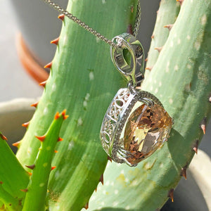 Modified Pear cut Morganite and Diamond Halo Pendant