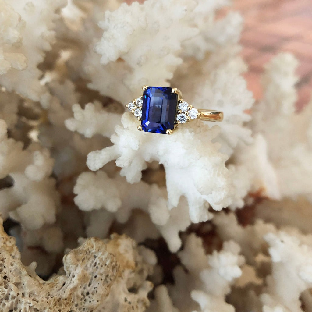  Handcrafted Emerald Cut Tanzanite Ring with Trilogy Diamond Accent