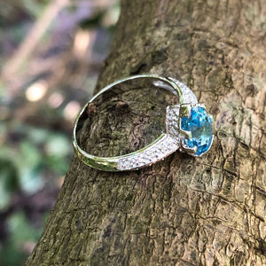 Pear Cut Blue Topaz White Gold Ring with Diamond Band Accent