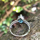 Pear Cut Blue Topaz White Gold Ring with Diamond Band Accent