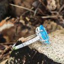 Marquise Cut Blue Topaz White Gold Ring with Diamond Accented Band