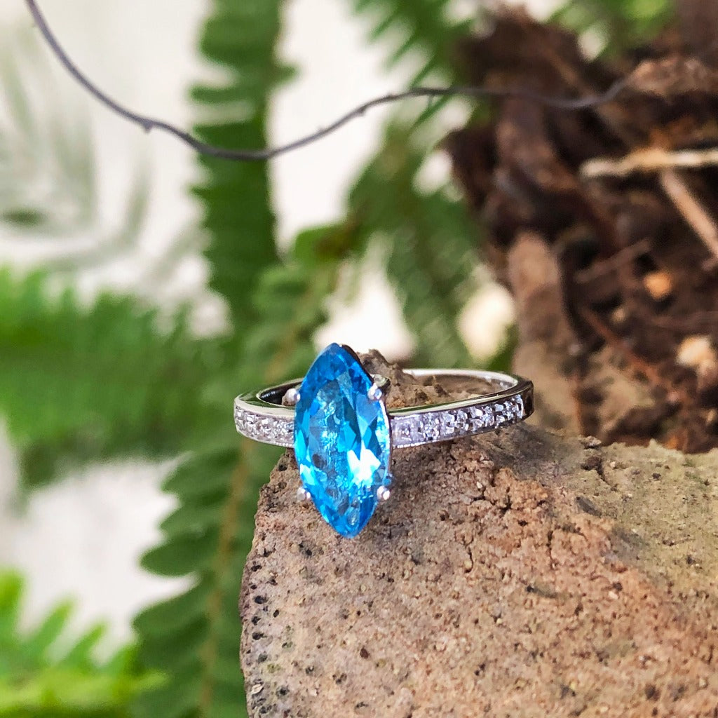 Marquise Cut Blue Topaz White Gold Ring with Diamond Accented Band