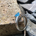 Trilliant Cut Blue Topaz With Diamond Point Accents