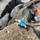 Trilliant Cut Blue Topaz With Diamond Point Accents
