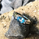 Landscape Set Oval Blue Topaz and Diamond ring