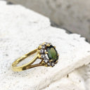 Oval Cut Green Tourmaline with Split Shank Yellow Gold Ring