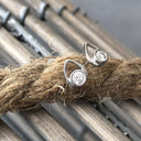 White Round Cut Diamonds in a White Gold Pear Shaped Stud