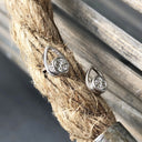 White Round Cut Diamonds in a White Gold Pear Shaped Stud