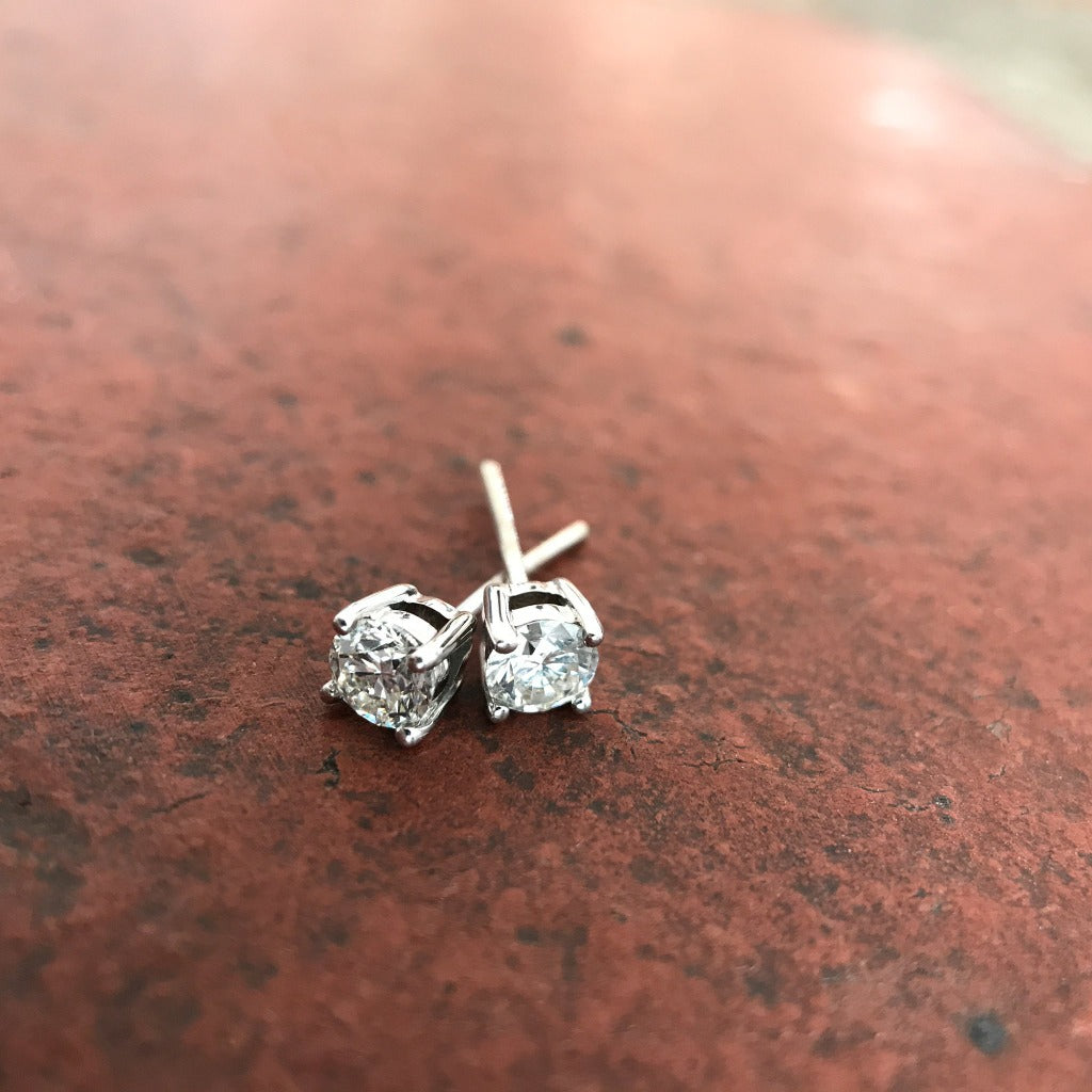 Four Claw White Diamond Studs