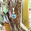 Blue Topaz, Diamond and Gold Pendant and Chain