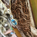 Blue Topaz, Diamond and Gold Pendant and Chain