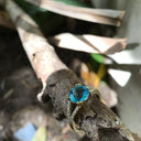 Majestic Round Cut Blue Topaz and Diamond Split Shank Ring