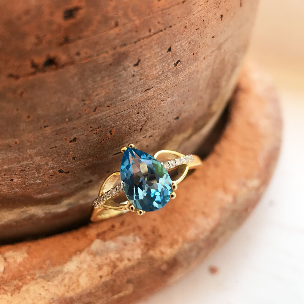 Pear Cut Topaz and Diamond Open Shoulder Ring
