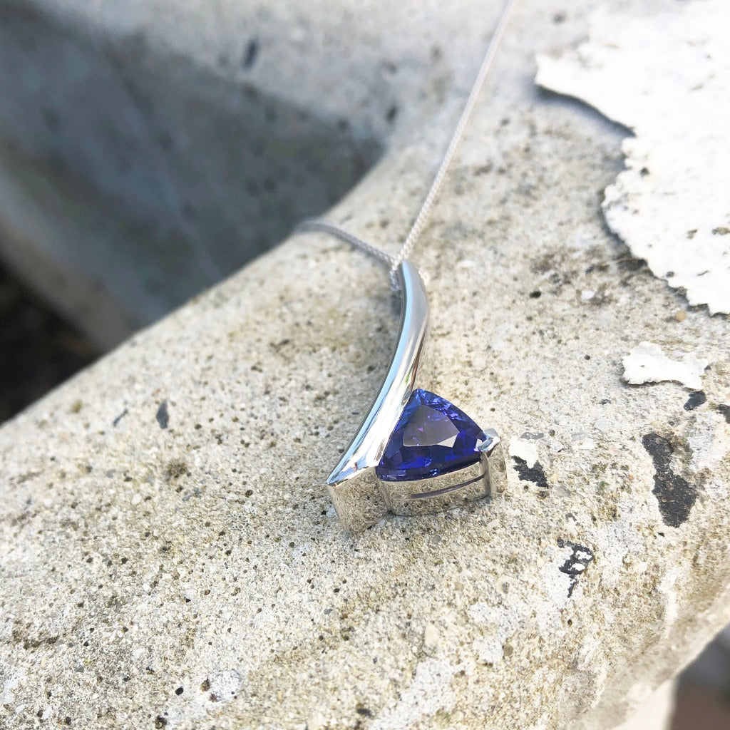 Handcrafted Trilliant-Cut Tanzanite Swish Pendant