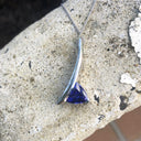 Handcrafted Trilliant-Cut Tanzanite Swish Pendant