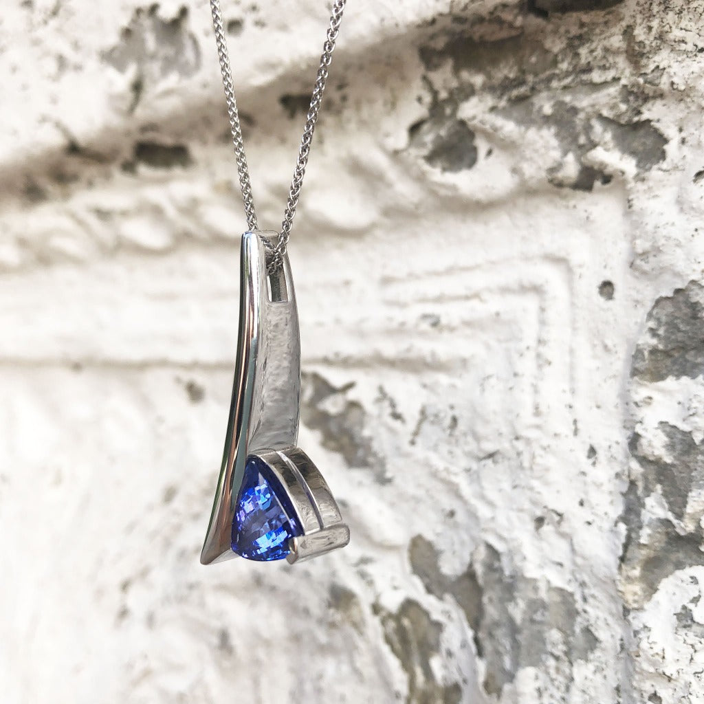 Handcrafted Trilliant-Cut Tanzanite Swish Pendant