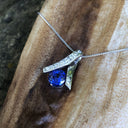 Handcrafted Tanzanite with Diamond Ribbon Pendant