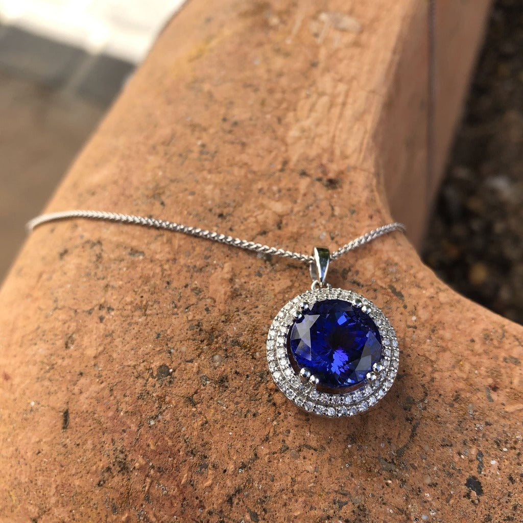 Scintillating Tanzanite and Double Diamond Halo Pendant