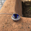 Scintillating Tanzanite and Double Diamond Halo Pendant
