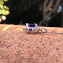 Scintillating Tanzanite and Double Diamond Halo Pendant