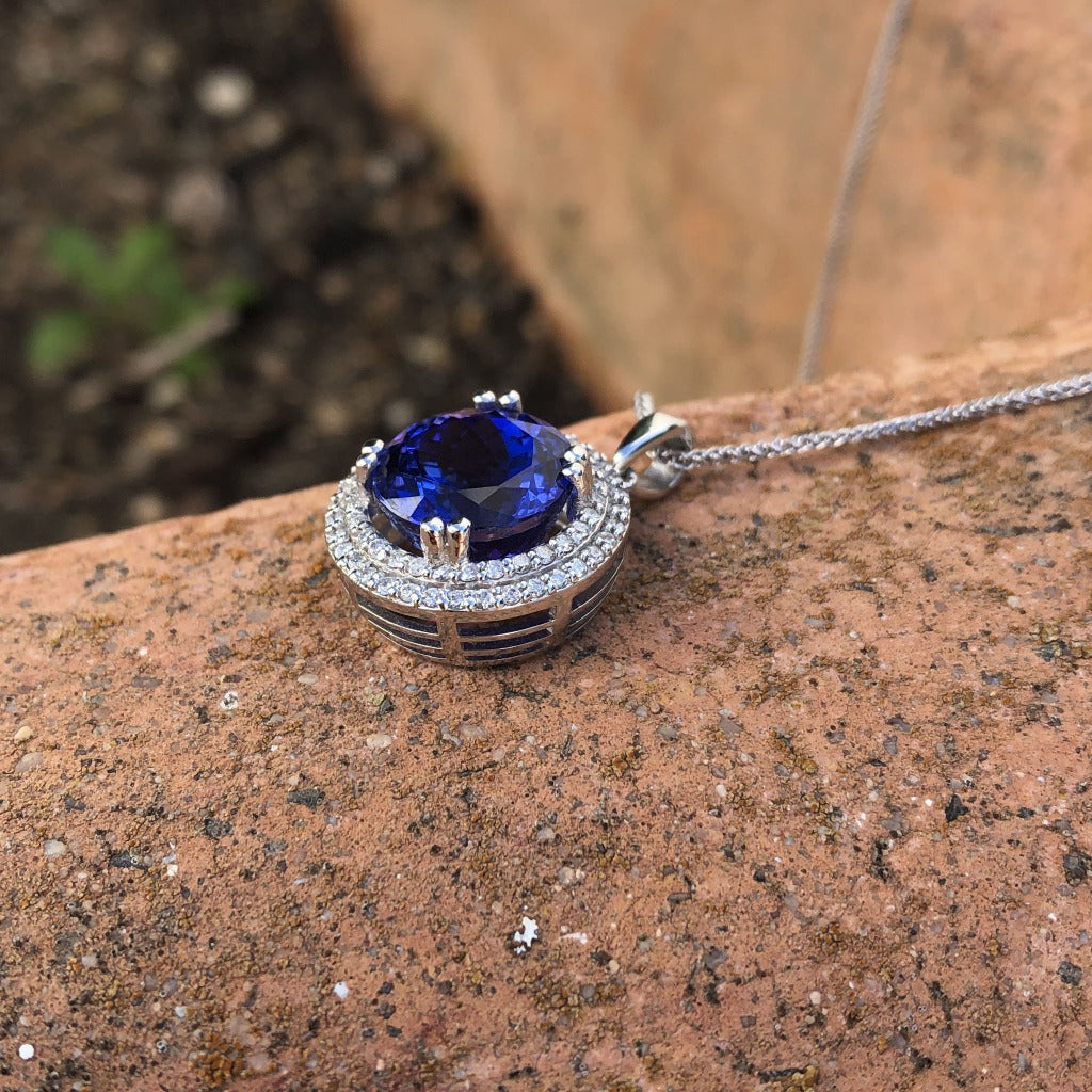 Scintillating Tanzanite and Double Diamond Halo Pendant