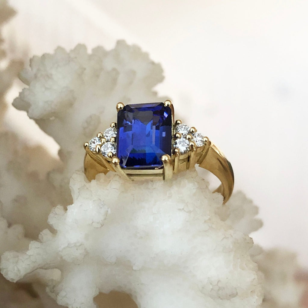  Handcrafted Emerald Cut Tanzanite Ring with Trilogy Diamond Accent