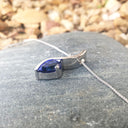 Pear Cut Tanzanite and Diamond Wave Pendant