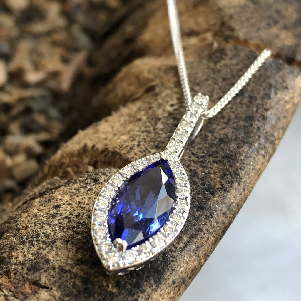 Marquise-Cut Tanzanite, Diamond Halo and Pavé Bale Pendant