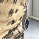 Marquise-Cut Tanzanite, Diamond Halo and Pavé Bale Pendant