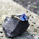 Dynamic Split Shank Trilliant-Cut Tanzanite Ring