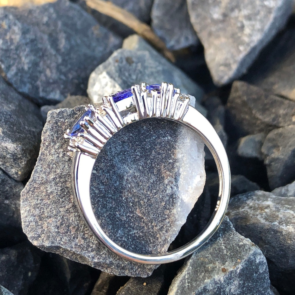 Three Trilliant Cut Tanzanite with diamond accent ring