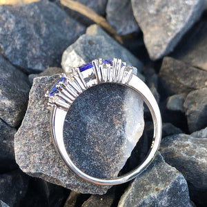 Three Trilliant Cut Tanzanite with diamond accent ring