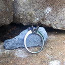 Oval-Cut Solitaire Tanzanite Ring with Diamond Claw and Band Accents