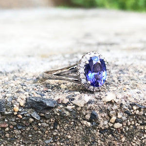 Oval Cut Tanzanite with Diamond Halo and Split Shoulder Ring