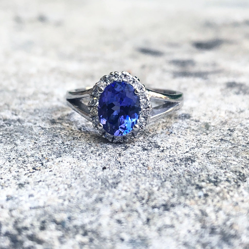 Oval Cut Tanzanite with Diamond Halo and Split Shoulder Ring