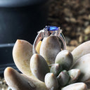 Trilliant Cut Tanzanite Ring with Trilogy Diamond Accents