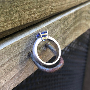 Handcrafted Unisex Emerald Cut Tanzanite Ring with Brushed Band Detail