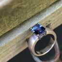 Handcrafted Unisex Emerald Cut Tanzanite Ring with Brushed Band Detail