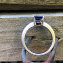 Handcrafted Unisex Emerald Cut Tanzanite Ring with Brushed Band Detail