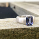 Handcrafted Unisex Emerald Cut Tanzanite Ring with Brushed Band Detail